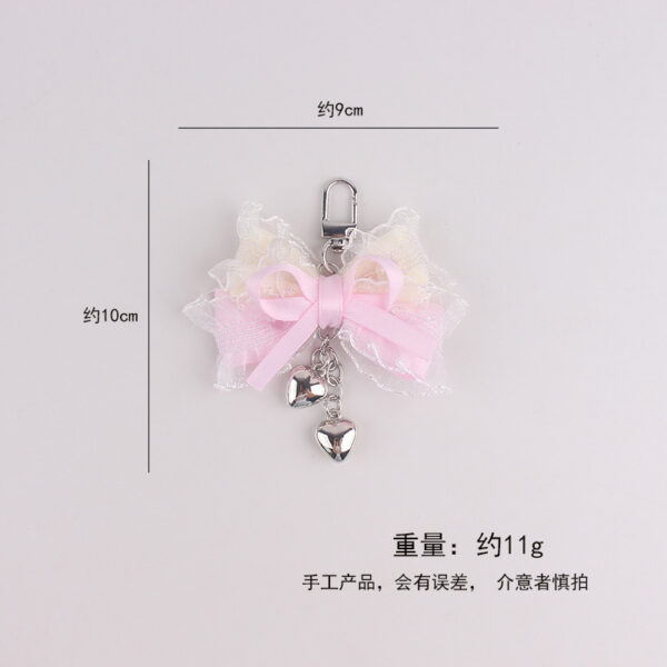 oly-44f71c0373a6422bdc5329ff2d06657d Wholesale Lolita Style Pink Silicone Bag Charm with Heart Lace Bow Fashion Accessory Keychain