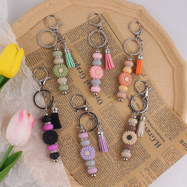oly-45c34be0a40d36f49b2dfd909a1569bb Wholesale Silicone Keychain - Stylish Bag Charm with Tassel, Pink, Party Favor Gift