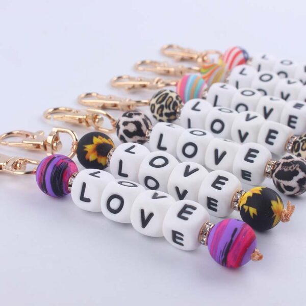 oly-463e0c40ee8d6f4b772e98c8ae8dc7a5 Wholesale Silicone Korean Style DIY Bead Bracelet Keychain Pink Fashion Accessory for Resale