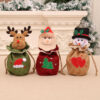 oly-4645912d5b0513b8fb69966207e25b4c Wholesale Burlap Christmas Gift Bag Cartoon 3D Drawstring with Jingle Bell Holiday Decor