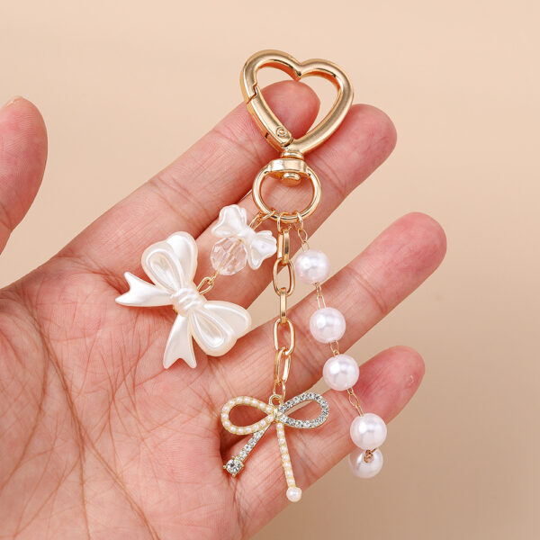 Wholesale Resin Golden Love Bow Heart Key Chain, Pearl Bow Keyring Trendy Boutique Resale Key Accessory