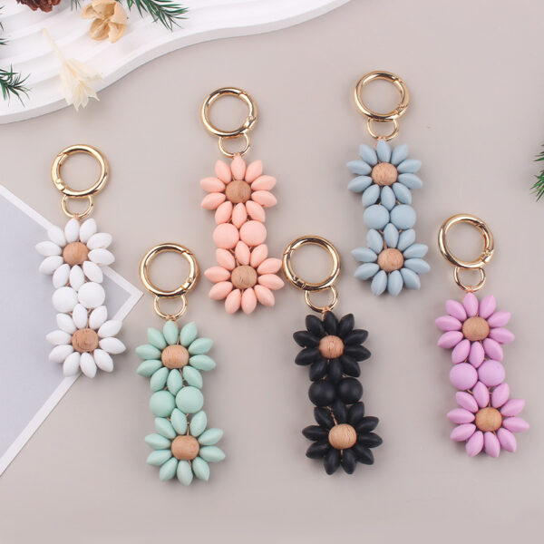 oly-483e8fab75dadaaf52bc0a35ace0ebc1 Wholesale Silicone DIY Beaded Bracelet Keychain Cartoon Flower Decorative Accessory Party Gift