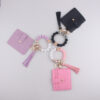 oly-486ac94eb476758e1b0598961549530d Wholesale Silicone Keychain Trendy Car Key Accessory Decorative Key Ring for Women Pink Boutique Resale