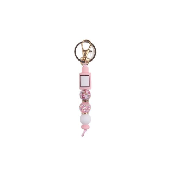 oly-487a8afa8ecbcdc2061e8eb4043ca958 Wholesale Fashion Silicone Perfume Bottle Keychain Resale Gift Accessory