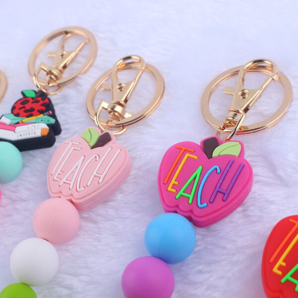 oly-48a76c6a42c55f499b99d2a3e062c1cf Wholesale Trendy Pink Silicone Bead Keychain Decorative Accessory Gift