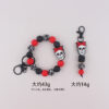 oly-48cb2b7bb9017f94e0ef7d1d03e5a246 Wholesale Silicone Halloween Skull Keychain Bracelet Jewelry Accessory