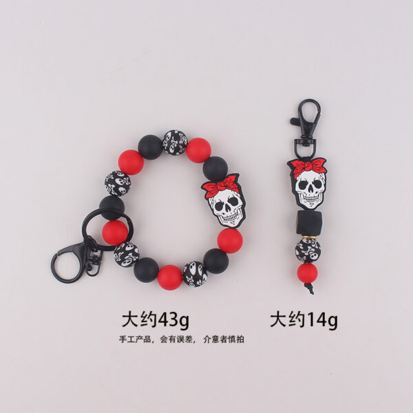 oly-48cb2b7bb9017f94e0ef7d1d03e5a246 Wholesale Silicone Halloween Skull Keychain Bracelet Jewelry Accessory
