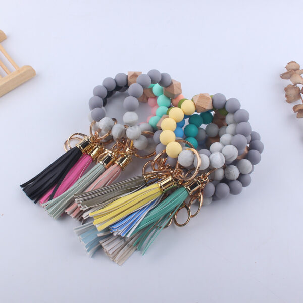 oly-48e7c27e522cf52aa598c2107df74d54 Wholesale Leopard Print Silicone Wrist Keychain Fashion Accessory DIY Beaded Key Ring Gift