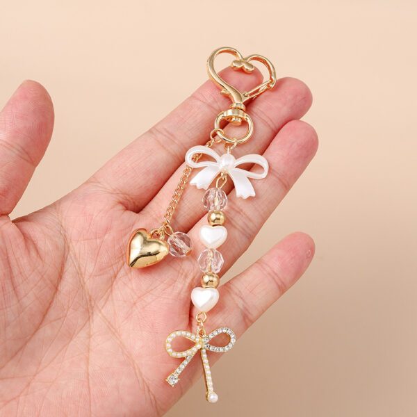 Wholesale Resin Golden Love Bow Heart Key Chain, Pearl Bow Keyring Trendy Boutique Resale Key Accessory