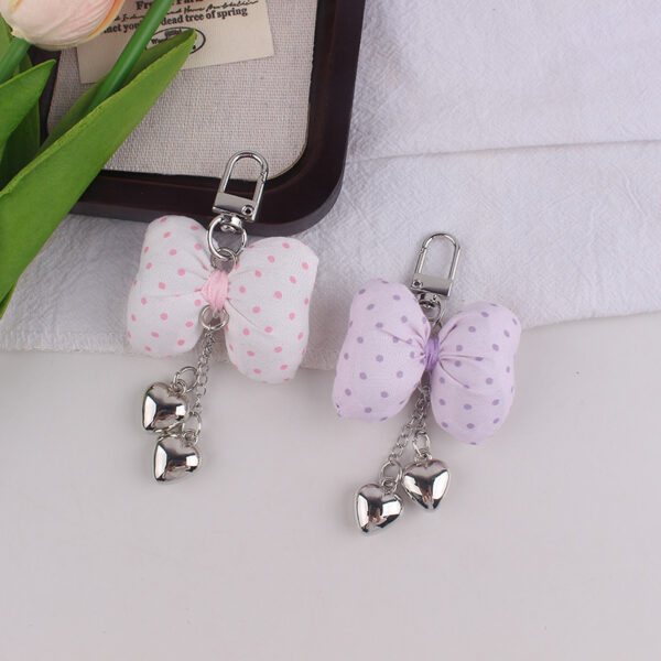 oly-49234236b1aed54237d592819bbf485b Wholesale Fashion Bow Tie Silicone Keychain Bag Charm Phone Accessory