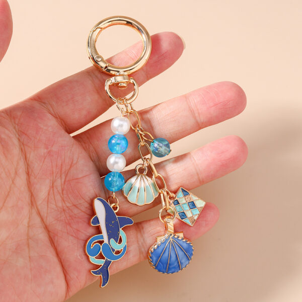oly-4a125c6383bf2bc1047611cd7909325a Wholesale Trendy Shell Whale Keychain Zinc Alloy Cartoon Ocean Animal Bag Charm