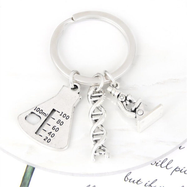 oly-4a72bc3b58847edbd3dfa2e60a5ffb24 Wholesale Alloy Flask Microscope DNA Biologist Keychain Pendant Trendy Gift for Colleagues