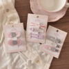 oly-4b7381c52500f06bbe3bfca918e78969 Wholesale Trendy Polka Dot Teddy Bear Duckbill Hair Clips Acrylic 3 Piece Set for Everyday Styling Boutique Resale