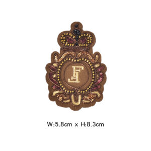 Brown letter badge