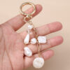 Wholesale Trendy Pearl Rhinestone Keychain Zinc Alloy Fashion Accessory for Bag or Car Key
