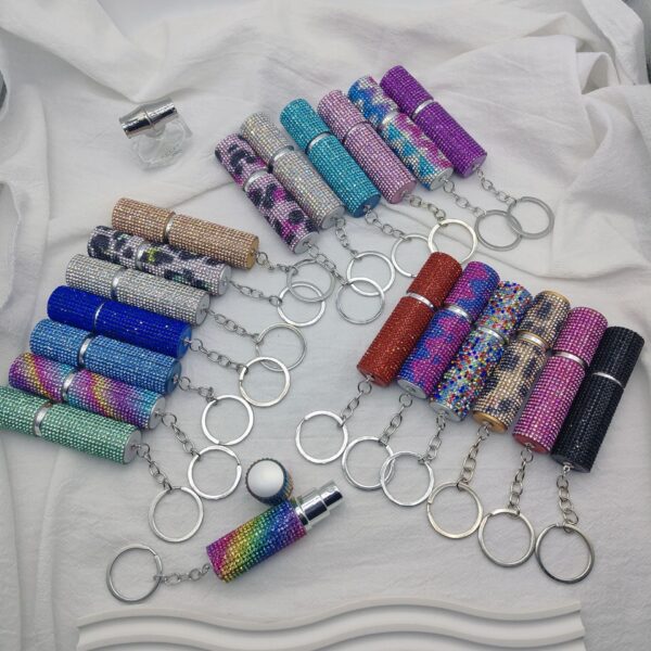 oly-4d11e65ad2f09f43e5d99662f9579539 Wholesale Rhinestone Perfume Bottle Keychain Decorative Wedding Gift for Women