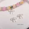 Wholesale Silver Alloy Light Luxury Bow Pendant DIY Jewelry Charm for Bracelet Phone Chain