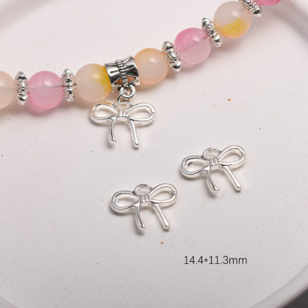 Wholesale Silver Alloy Light Luxury Bow Pendant DIY Jewelry Charm for Bracelet Phone Chain