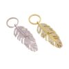 oly-4f3a95fbbf68a81fb7034d804cb247d2 Wholesale Light Luxury Feather Rhinestone Long Pendant Keychain Metal Car Key Accessory