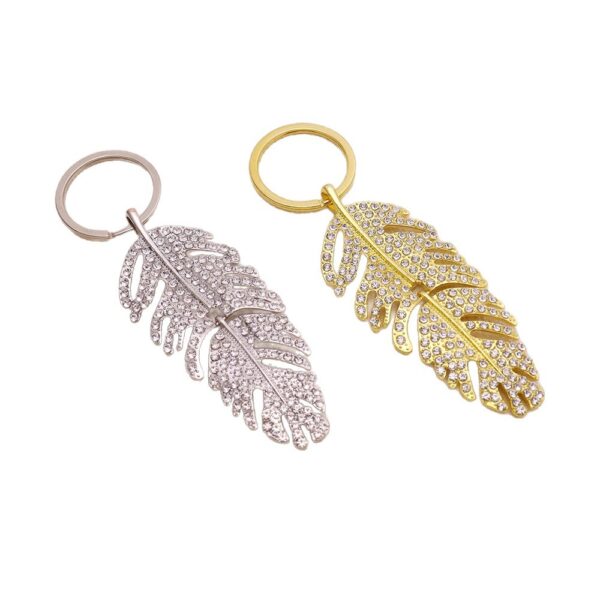 oly-4f3a95fbbf68a81fb7034d804cb247d2 Wholesale Light Luxury Feather Rhinestone Long Pendant Keychain Metal Car Key Accessory
