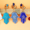 oly-4f48a79910bd3a24cd68d75eb5c006e0 Wholesale Trendy Hamsa Hand Rhinestone Keychain Light Blue Flannel with Tassel Boutique Resale Gift