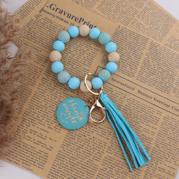 oly-4f8d0bdcc0c248802a18bcca0dfc1a32 Wholesale Face Silicone Keychain Key Ring Party Gift Bag Charm Accessory