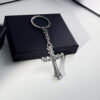 oly-50eb9dbc1ae0df3a722351506e83c5ec Wholesale Vintage European Style Cross Keychain Pendant Zinc Alloy Car Key Bag Charm Boutique Resale Accessory