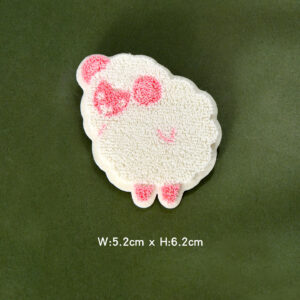 Pink toothbrush embroidered with sheep