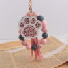 oly-52416a7577f9e707fc73301e3cda9df7 Wholesale Bean Paste Silicone Dog Paw Keychain Trendy Party Gift for Kids