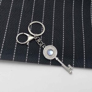 Diamond-encrusted key transparent blue [lobster buckle style]