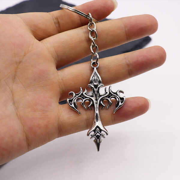 oly-54173bd252f4325f5ffa64586237e06f Wholesale Silver Titanium Steel Flame Cross Keychain Trendy Car Key Accessory