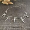 oly-5538d459f7394f24dec202d6b397a64a Wholesale Zinc Alloy Gothic Crow Skull Pendant Necklace Fashion Accessory for Men Edgy Bird Bone Design Choker for Daily Wear or Gift Giving