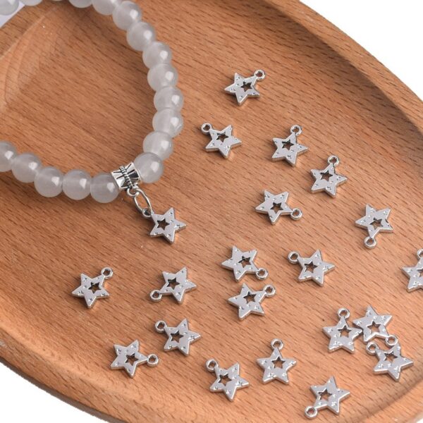 oly-55c09595db55ec78158e447204ba1cbf Wholesale Stylish Five Point Star Hollow Pendant Zinc Alloy Electroplated DIY Jewelry Accessory