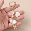 Wholesale Trendy Pearl Rhinestone Keychain Zinc Alloy Fashion Accessory for Bag or Car Key