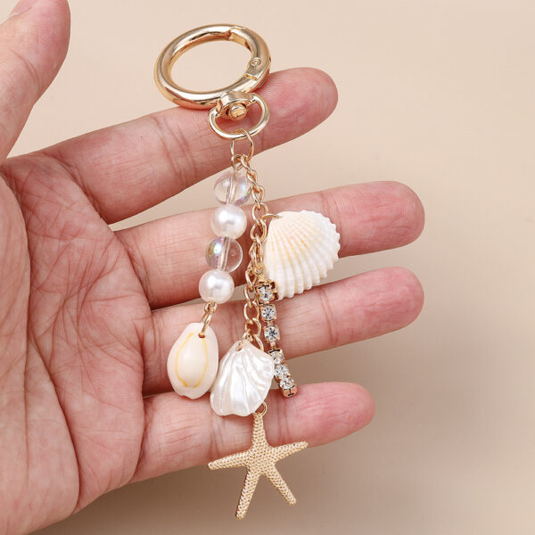 Wholesale Trendy Pearl Rhinestone Keychain Zinc Alloy Fashion Accessory for Bag or Car Key