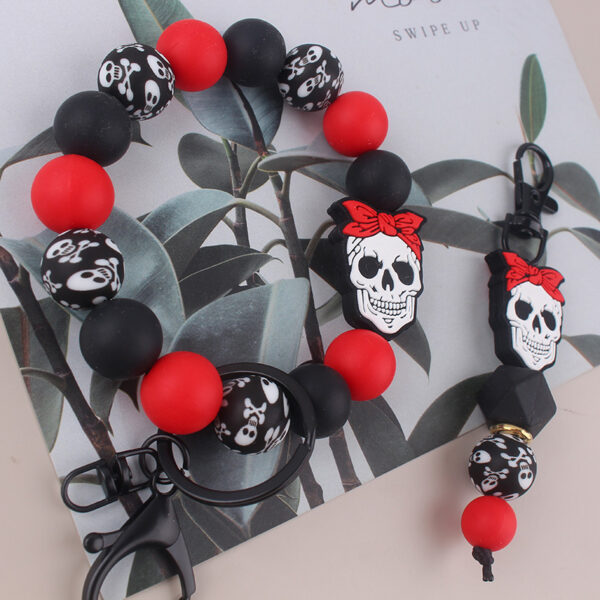 oly-56173a72d1cd5f1a6a3c86eb3e257665 Wholesale Silicone Halloween Skull Keychain Bracelet Jewelry Accessory
