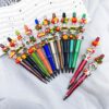 oly-566ef8aafc79cd8146f8149196e0338d Wholesale Hand Painted Beaded Christmas Magic Wand Pen with Rotating Tip Multi Color Elk Tree Design Party Favor