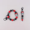 oly-56af8968ae83d2cddf60b963572a9141 Wholesale Silicone Halloween Skull Keychain Bracelet Jewelry Accessory