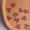 oly-56b51c8e6cb206770167b7370691ec03 Wholesale Alloy Baked Red Cherry Pendant Trendy Jewelry Accessory for DIY Bag Charm Keychain