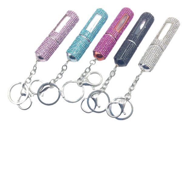 oly-56febb1f11607832f737b18c43bfeaa3 Wholesale Fashion 5ml Refillable Perfume Spray Bottle Keychain Rhinestone Metal White Gift