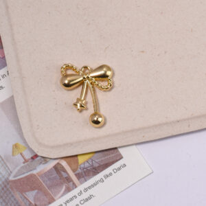 Hanging bow-k gold