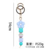oly-573ad4b82e05226474ce2a234f27fb7e Wholesale Pink Silicone Bead Bracelet Cartoon Flower Keychain DIY Pendant Fashion Accessory Gift