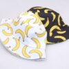 oly-57ef5058ac9fb2aab9cbd886fbc9c01c Wholesale Banana Print Double-Sided Fisherman Hat Trendy Hip Hop Sun Hat for Men Women