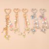 oly-588df5ac629e3d4437733737ee53e0ed Wholesale Modern Minimalist Bow Bead Keychain, Zinc Alloy Star Heart Design, Casual Bag Charm Accessory