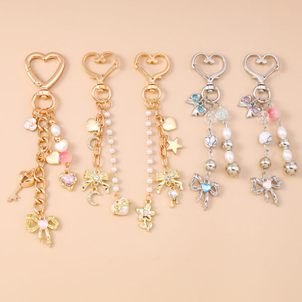 oly-588df5ac629e3d4437733737ee53e0ed Wholesale Modern Minimalist Bow Bead Keychain, Zinc Alloy Star Heart Design, Casual Bag Charm Accessory