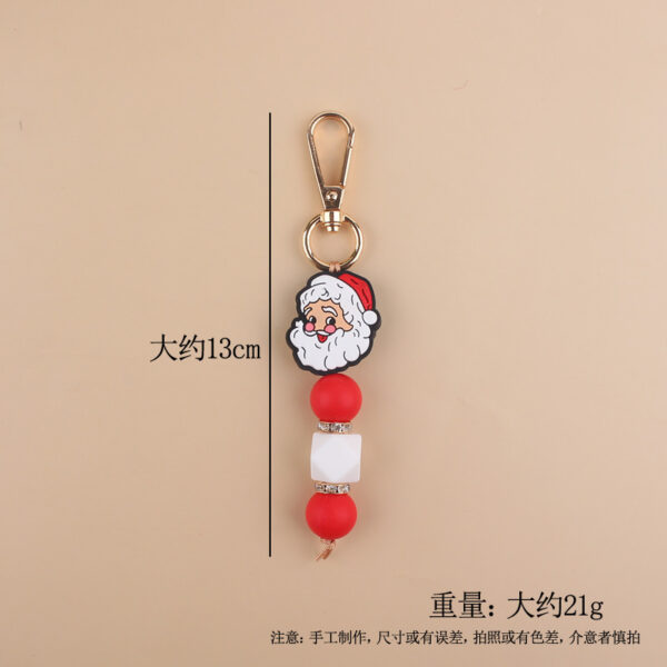 oly-589d8b75e92272be8d2b165a56f5c0cf Wholesale Silicone Santa Claus Keychain Chic Holiday Gift Bag Charm Car Accessory