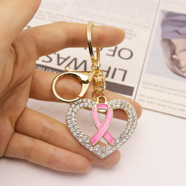 oly-58aa6dca1aa90d44e98dbb39b1f5f3e0 Wholesale Modern Rhinestone Heart Keychain Alloy Pink Ribbon Car Key Accessory Gift