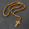 oly-5b3fbd6e2ffe4777af90b0387af1aa34 Wholesale Handmade Wooden Cross Rosary Necklace Chic Fashion Accessory for Gift or Boutique Resale