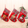 oly-5ba2fbe7c88fd4ca9582ddf1dce1583f Wholesale Flannel Plaid Christmas Stocking with Bell Decorative Holiday Gift Bag