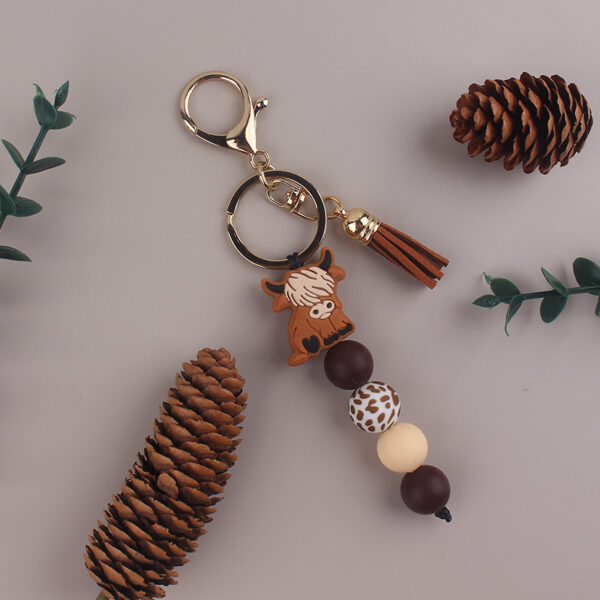 oly-5baf2bdd3d296bb0df9e7ebe4c8c980c Wholesale Green Silicone Yak Tassel Keychain Fashion Accessory Gift for Party